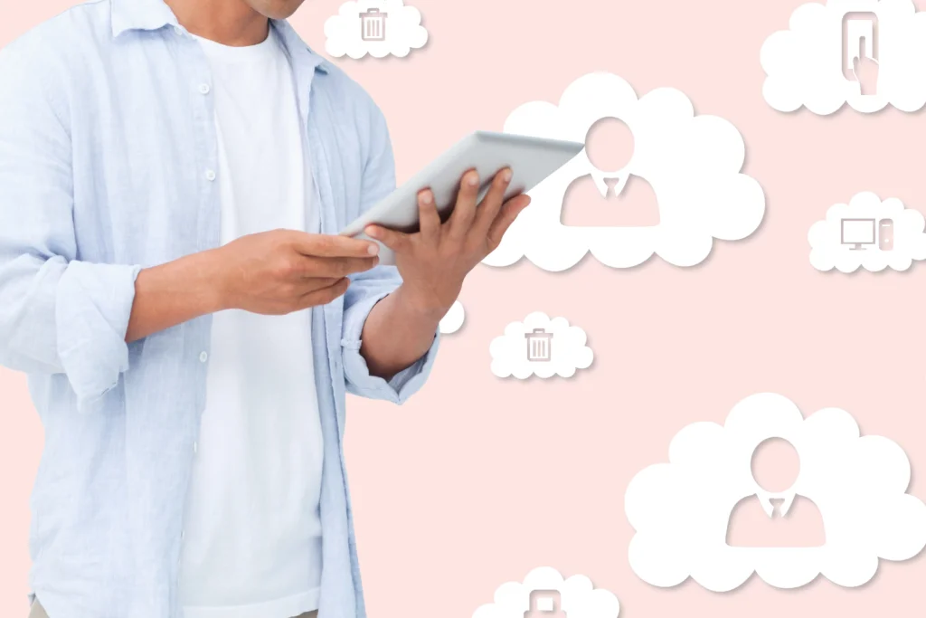 A person holding a tablet with cloud thoughts icons at the background.